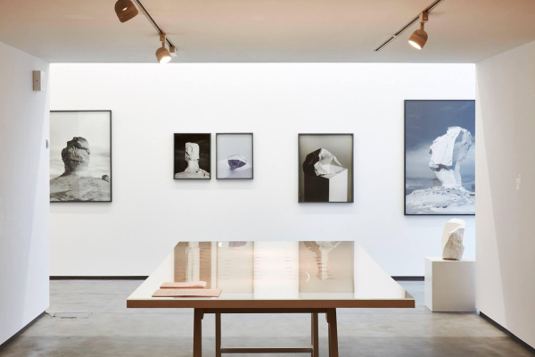 Ana Mendes, The People's Collection,&nbsp;mixed media (two tables, collection postcards, publications, documents, glass), 2014-on-going,&nbsp;exhibition overview MAC International 2016', MAC, Belfast, UK. Photo courtesy of Simon Mills.